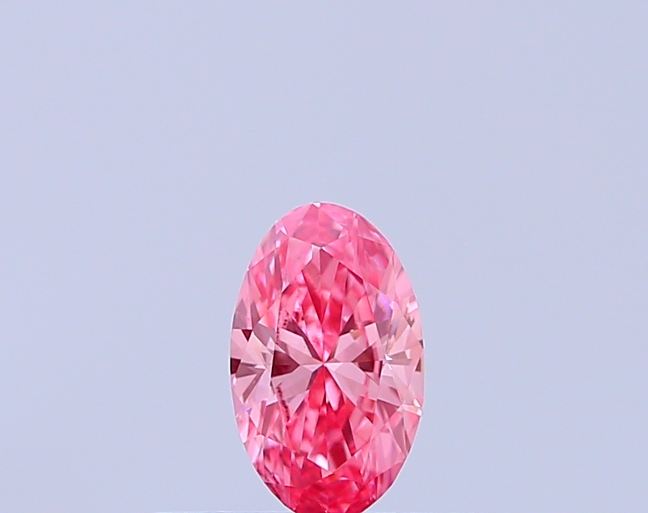 Actual 0.23 carat Vivid Pink Oval lab-grown diamond
