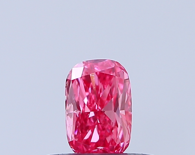 Actual 0.33 carat Fancy Vivid Pink Cushion lab-grown diamond