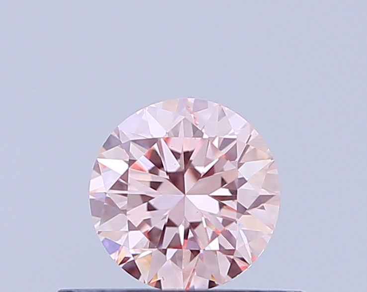 Actual 0.36 carat Fancy Intense Pink Round lab-grown diamond