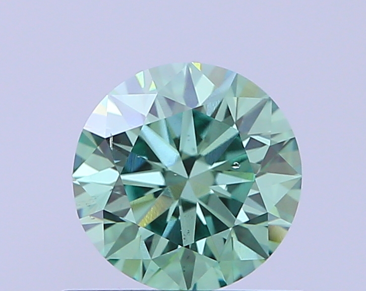 Actual 0.69 carat Vivid Green Round lab-grown diamond
