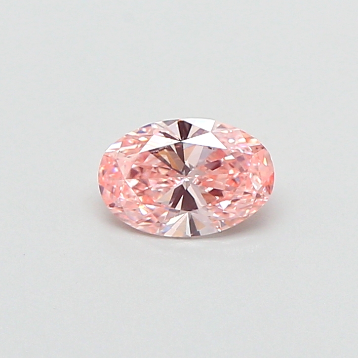 Actual 0.39 carat Fancy Intense Pink Oval lab-grown diamond