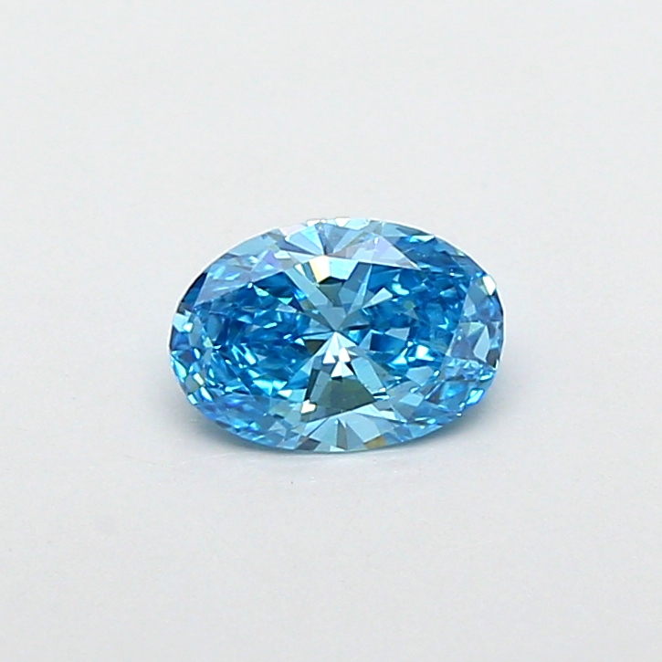 Actual 0.48 carat Fancy Vivid Blue Oval lab-grown diamond