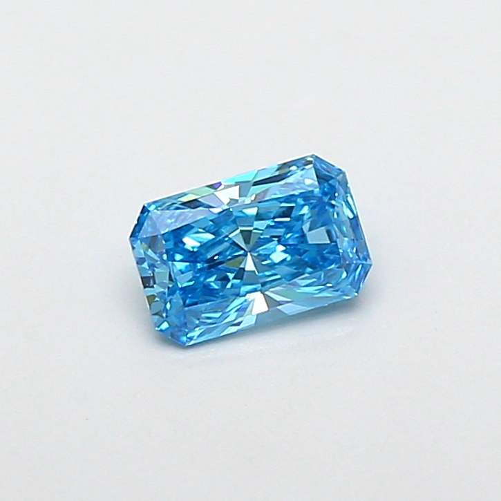 Actual 0.44 carat Fancy Vivid Blue Radiant lab-grown diamond