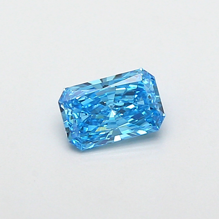 Actual 0.47 carat Fancy Vivid Blue Radiant lab-grown diamond