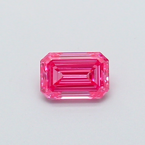 Actual 0.29 carat Fancy Vivid Pink Emerald lab-grown diamond