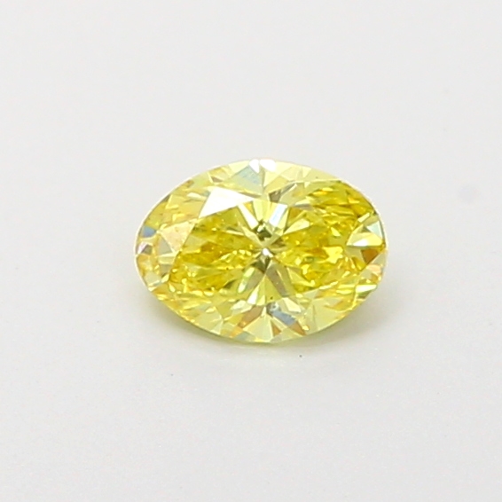 Actual 0.29 carat Fancy Intense Yellow Oval lab-grown diamond