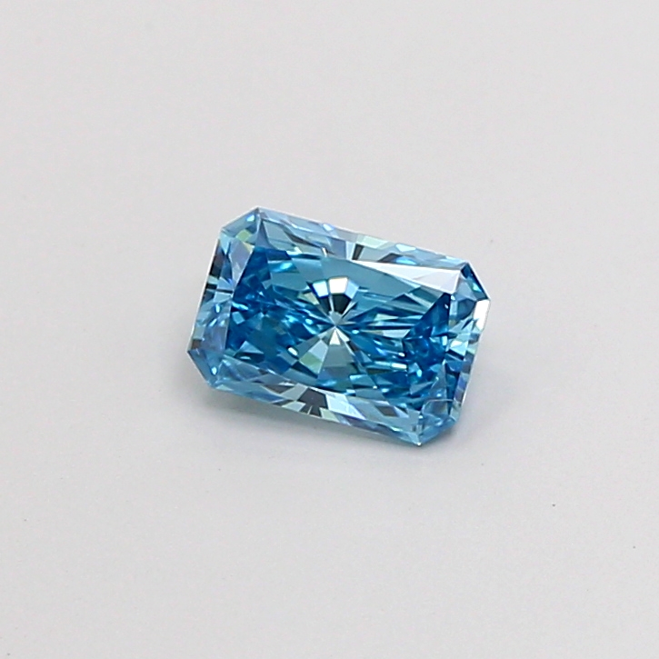 Actual 0.51 carat Fancy Vivid Blue Radiant lab-grown diamond