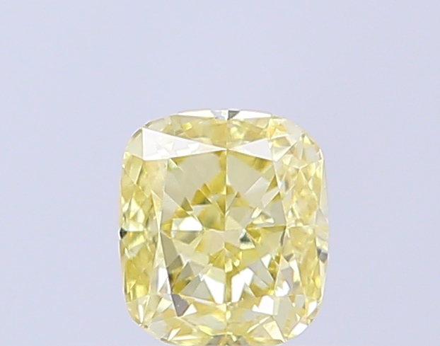 Actual 0.42 carat Fancy Yellow Cushion lab-grown diamond